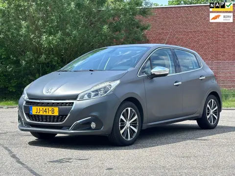 Peugeot 208 1.2 PureTech Allure Navigatie*Half leder*Distributie vervangen*Dealer onderhouden*Cruise