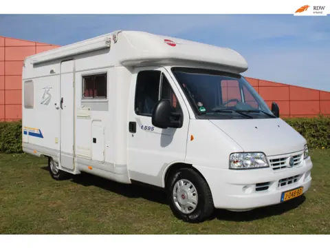 Burstner t595 (2002) 106 PK, Groot vast bed, Nwe distributie.