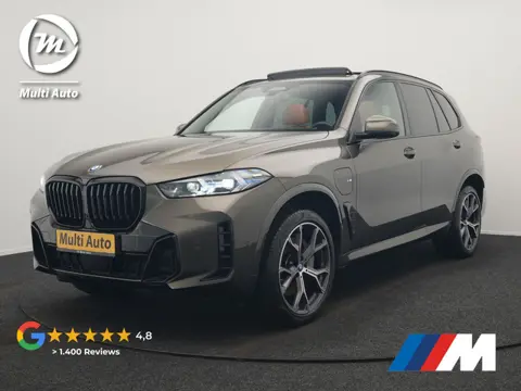 BMW X5 xDrive50e M Sport PHEV 490pk | SOH 96,3 Dealer O.H. | Panodak | Luchtvering | Laser LED | Ada