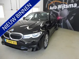 BMW 3-serie 320e Business Edition Plus Leer | Schuifdak | LED | LMV 17"| NL auto | 1e eig.