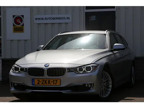 BMW 3 Serie Touring 320i High Executive*NL-Auto*Perfect Onderh.*Leder/Stoelverw./Gr. Navi/Keyless En