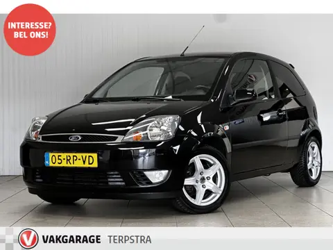Ford Fiesta 1.4-16V Futura/ Half-Leder/ Airco/ Elek. pakket/ Bluetooth/ AUX & USB/ Armsteun/ LEDER. 