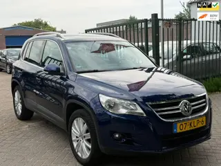 Volkswagen Tiguan 2.0 TSI Sport&Style 4Motion 2e eigenaar dealer onderhouden airco trekhaak parkeer 