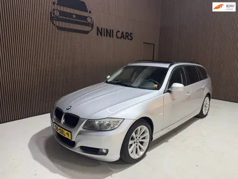 BMW 3-serie Touring 320i Business Line pano leer/stof 6vers