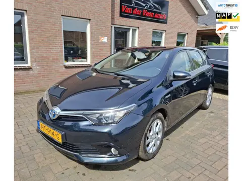 Toyota Auris 1.8 Hybrid Aspiration. 1ste eigenaar, o.a. cruise, camera, isofix, aux. Zeer zuinige au