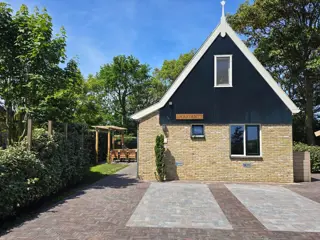 Vakantiehuis omringd door een prachtige tuin met aangrenzende alpacaweide