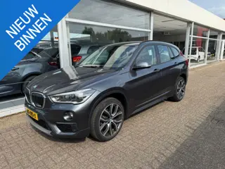 BMW X1 sDrive18i High Executive | 1e eigenaar | Automaat | Afneembare trekhaak | Airco | Elektrische
