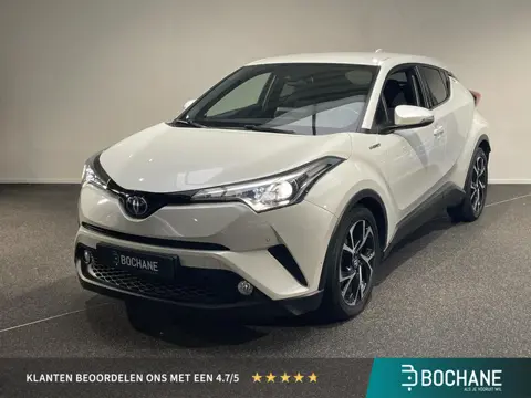 Toyota C-HR 1.8 Hybrid Bi-Tone | Stoelverwarming | Trekhaak | Achteruitrijcamera | Navigatie |