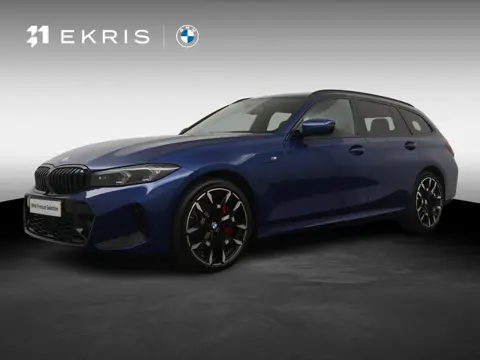 BMW 3 Serie Touring 330e | SoH 100% | Individual Le Mans Blue | M Sportpakket Pro | Head-Up | Adapti