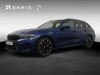 BMW 3 Serie Touring 330e | Individual Le Mans Blue | M Sportpakket Pro | Head-Up | Adaptive Cruise |