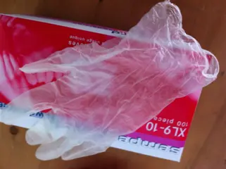 Partij vinyl disposable handschoenen