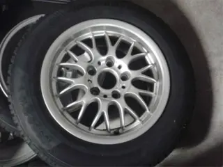 15 inch BMW velgen met Continental wintercontact band