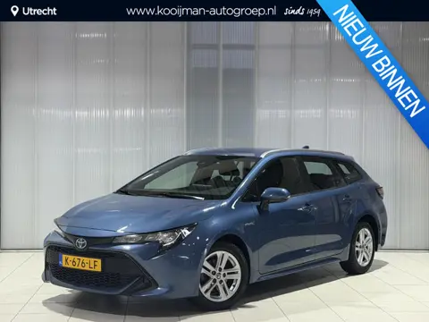 Toyota Corolla Touring Sports 1.8 Hybrid Business | All season banden | Dealer onderhouden |