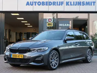 BMW 3 Serie Touring 330e High Exec. PHEV M-Sport | Leder | ACC | Camera | Trekhaak |