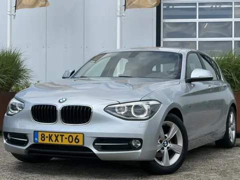 BMW 1-serie 114i EDE Business Sport 100pk | Airco automatisch | Bi-xenon koplampen | Cruise control 