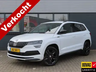 Škoda Karoq 1.5 TSI ACT Sportline Business DSG | verwarmbare voorruit | voorstoelen + achterbank ver