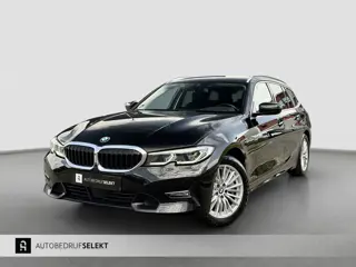 BMW 3-serie Touring 330e xDrive | Laser | Trekhaak | Head Up | 360 | Sfeerverlichting | Dodehoek | 1