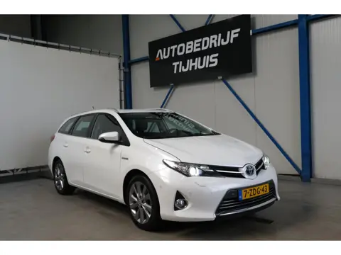 Toyota Auris Touring Sports 1.8 Hybrid Executive - Airco, Cruise, Navi, PDC, Camera, Trekhaak.