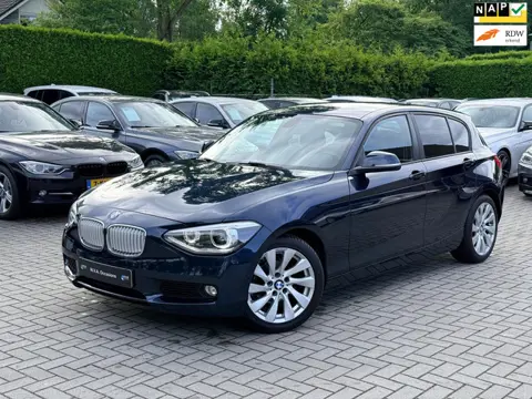 BMW 1-serie 116i Business+ Sport|Nieuwe Ketting + Klepseals|Navigatie|Cruise control|Airco|Sport sto