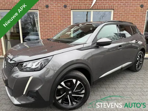 Peugeot 2008 1.2 PureTech Allure VIRTUAL.COCKPIT / HALF.LEER / GROOT.NAVI / C