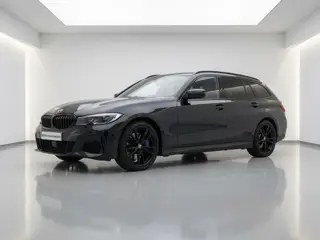 BMW 3 Serie Touring M340i xDrive | Panorama | Camera | Laser | Driving Assistant Professional