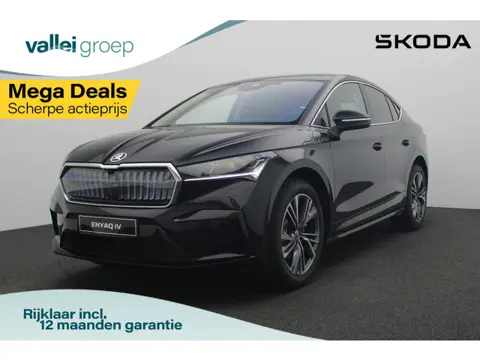 Skoda Enyaq Coupé iV Business Edition Plus 204 pk | Warmtepomp | Panoramadak | Leder | Camera | Matr