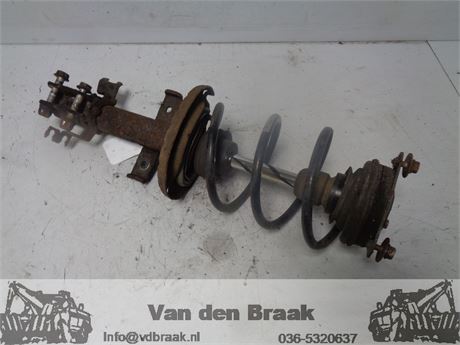 Renault Clio (Fase III) 1.2 16V 2005-2013 Schokbreker links voor