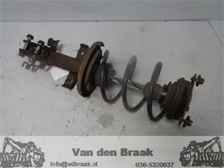 Renault Clio (Fase III) 1.2 16V 2005-2013 Schokbreker links voor