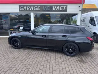 BMW 3 Serie Touring 330e High Executive (bj 2021)