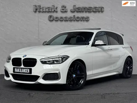 BMW 1-serie M140i xDrive High Executive HK Pano Memory Camera