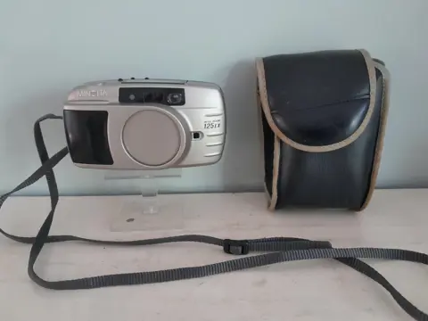 Minolta Riva Zoom 125EX 35 mm camera met tas