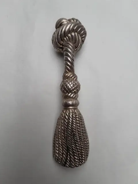 Vintage flesopener met touwkwast