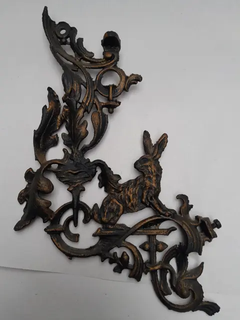 set of 3 antique ornaments with hare. parts of an old oil lamp