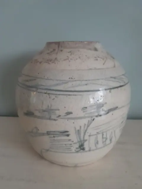 Antique ginger jar with painting of a landscape
