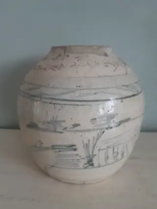 Antique ginger jar with painting of a landscape
