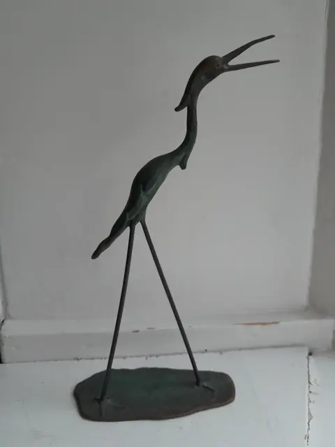 bronzen beeldje van een reiger