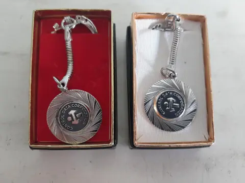 Vintage Control Data Corporation keychain - set of 2