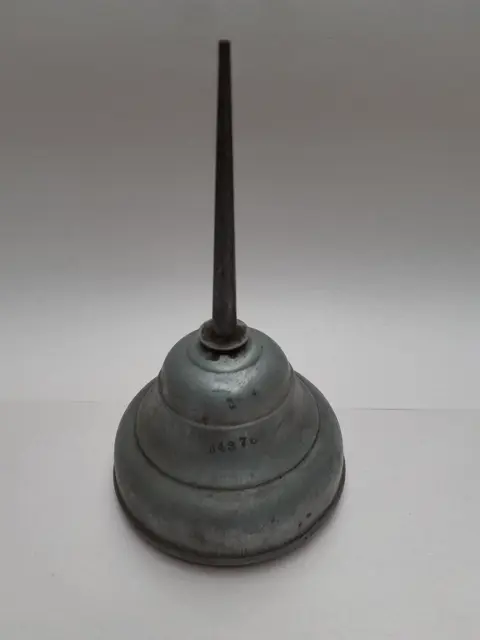 Vintage duim pers olieblik Perko