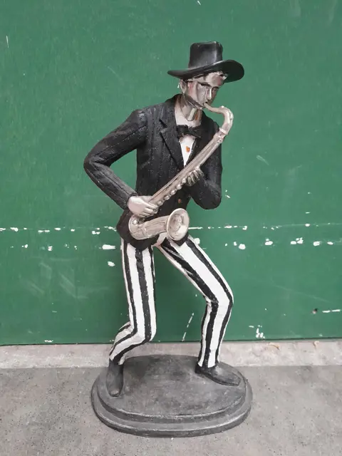 beeld Saxofonist muzikant  saxofoon