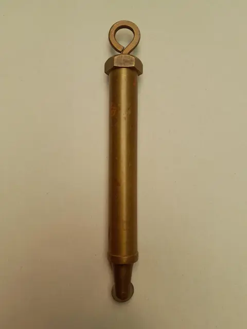 vintage brass grease gun with wheel