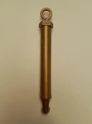 vintage brass grease gun with wheel