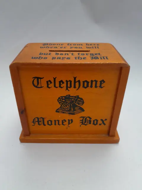 Vintage houten telefoon spaarpot  Penny Bank