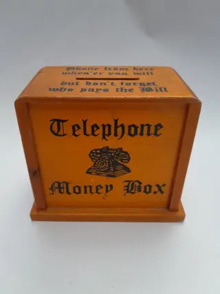 Vintage houten telefoon spaarpot  Penny Bank