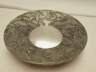 Tinnen bord ASN met dieren figuren