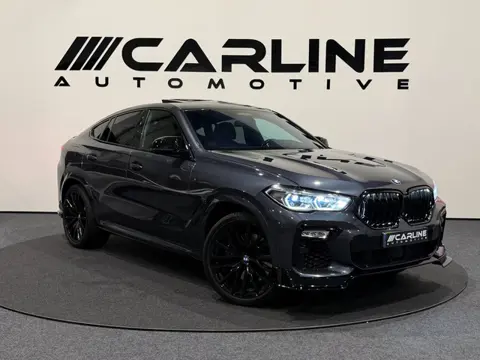 BMW X6 M50i High Executive PANO HUD VIRTUAL ACC SKYLOUNGE SFEERVERL. 360 ASSIST H&K NAP GARANTIE APK