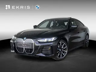 BMW i4 xDrive40 High Executive | M Sportpakket | Glazen schuif-/kanteldak | Trekhaak | Showroom Sele
