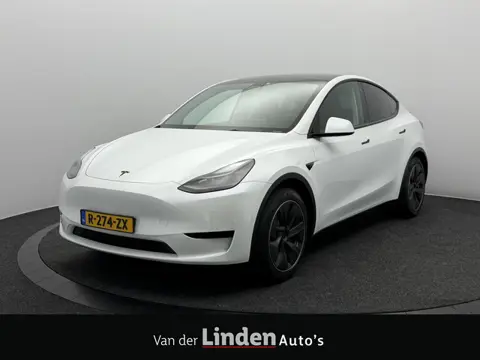 Tesla Model Y RWD 58 kWh SOH 94,6% | Afneembare Trekhaak | Warmtepomp | Parelmoer Wit