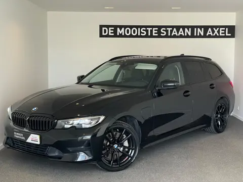 BMW 3 Serie Touring 330e High Executive (bj 2021)
