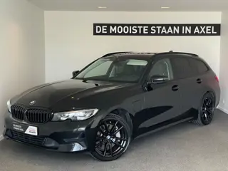 BMW 3 Serie Touring 330e High Executive (bj 2021)