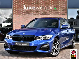 BMW 3 Serie Touring 330e xDrive M-Sport Pano Trekh El-zetels HUD Laser 19inch Adp-onderstel